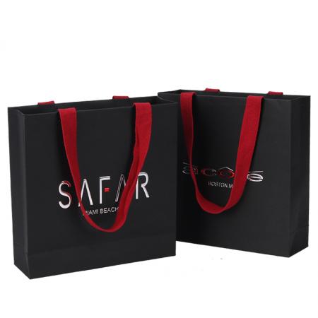 Personality custom printed black luxury brand retail shopping packaging clothing paper bag with red handle